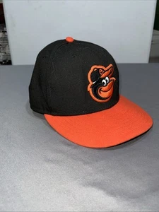 New Era 59Fifty Men Fitted Cap Size 7 Baltimore Orioles Black On Field Road -61 - Picture 1 of 9