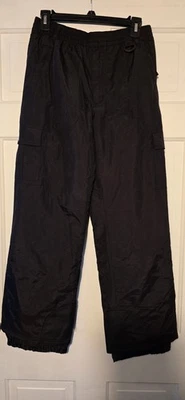 Pantalones de esquí unisex negros Sport Essentials para jóvenes talla 14th Foto 1 de 4