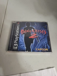 Dino Crisis 2 (Sony PlayStation 1, 2000) PS1, con tarjeta de registro, manual, ¡fotos en funcionamiento! - Imagen 1 de 10