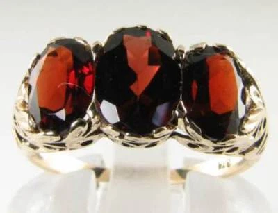 LARGE 9K GOLD MADAGASCAN GARNET ART DECO INS TRILOGY RING FREE SIZE - Image 1 of 4