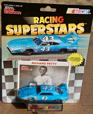 1991 Гоночные чемпионы NASCAR Ричард Петти #43 Plymouth Superbird 1:64 новый нераспакованный - Изображение 1 из 4