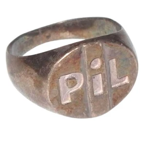 Vintage PIL Public Image Ltd Ring Silvery Metal Small Size Rare Pendant Style - Picture 1 of 10