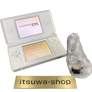 Used Nintendo DS Lite Crystal White Handheld System Region Lock With Charger - Picture 1 of 9