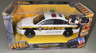 Jada Toys Hero Patrol Pittsburgh Bureau of Police 2010 Chevy Impala NIB 1:32 - Image 1 of 4