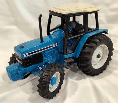 Tractor de juguete Ford 1/16 6640 4x4 de Ertl Foto 1 de 4