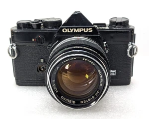 Macchina fotografica analogica 35mm Olympus OM-1 ottica olympus 1:1.4 per ricamb - Foto 1 di 14