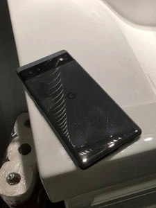 Google Pixel 6A, couleur noire, état d'usage en douceur - Photo 1 sur 7