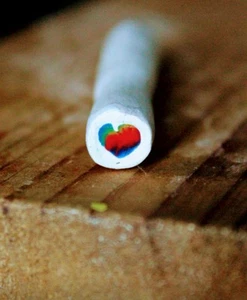 Tie Dye Rainbow Heart Polymer Clay Cane/ White Background - Picture 1 of 6