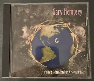 Gary Hempsey It’s Hard To Stand Still On A Moving Planet CD - Foto 1 di 3