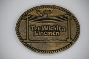 Hebilla de cinturón vintage The Wichita Linemen latón liso 1984 DynaBuckle Limited 389 - Imagen 1 de 2