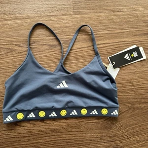 Adidas Junior Mädchen blauer Smiley World Trainings BH, Größe XL - Neu mit Etikett - Bild 1 von 6