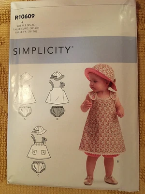 Unused pattern baby dress, hat, panty, sizes XS-XL, dated 2020 Simplicity - Image 1 of 2