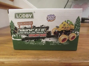 NEW IN BOX PRISTINE! LODBY Dinosaur Stunt Car 2 Pack 4x4 Power Rotation 360 - Picture 1 of 6