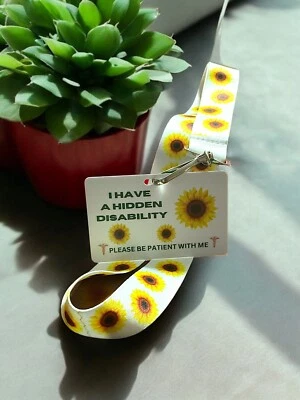 Cordón de girasol y tarjeta de identificación médica de PVC con paquete de funda de plástico Foto 1 de 4