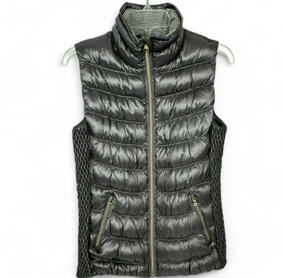 Chaleco acolchado Calvin Klein Performance para mujer mediano gris metálico con cremallera usado en excelente estado Foto 1 de 4