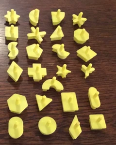 PERFECTION Game Replacement Parts 25 Yellow Pieces Shapes - Picture 1 of 2