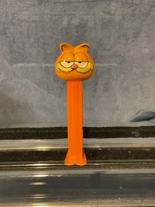 Garfield con Cara Crema en un Pie Delgado 3.9 Austria Tallo, Botón Caramelo Rojo - Imagen 1 de 6