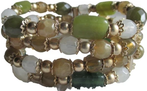 Vintage Liz Claiborne signiert goldfarben 4 Reihen Armband Stretch Acryl Perlen - Bild 1 von 5
