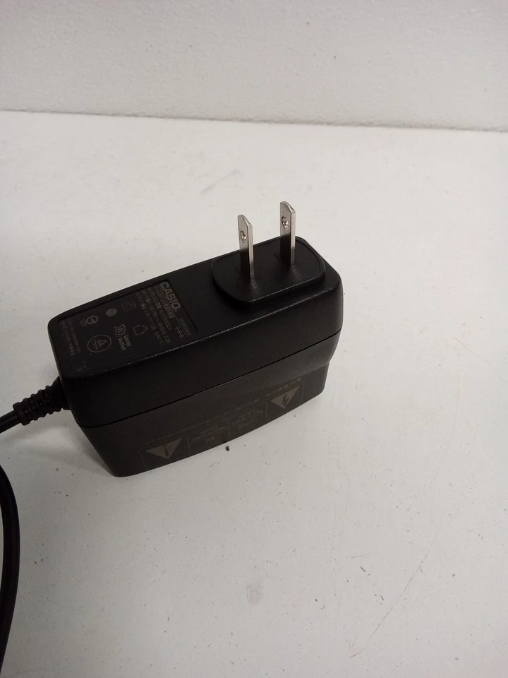 Casio AD-E95100LU AC Adapter 9.5V 1.0A for Casio Keyboard PSM10A-095(VE) #o3 - Image 1 of 3