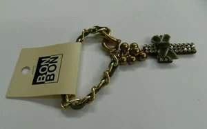 BRACCIALE BON BON CATENA ORO&VERDE CROCE SWAROVSKI FIOCCO VELLUTO F83 - Picture 1 of 2