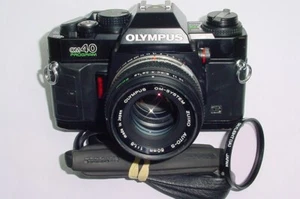 Cámara fotográfica Olympus OM40 Program 35 mm + lente Olympus 50 mm F/1,8 Zuiko - Imagen 1 de 6
