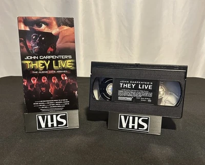 John Carpenter’s They Live (1989, VHS – GoodTimes) 1999 Release - Tested - Image 1 of 4