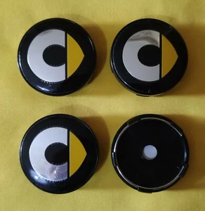 4 TAPPO COPRIMOZZO CERCHI COMPATIBILI SMART 60MM GIALLO YELLOW GEN NERO - Foto 1 di 2