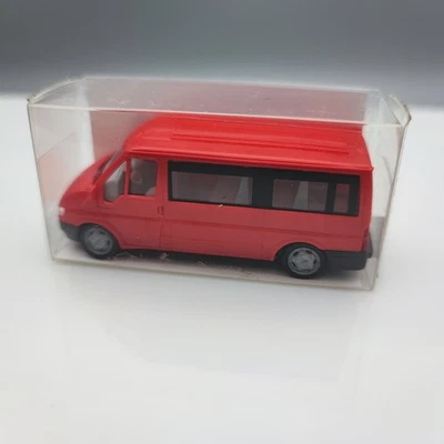 Rietze 1:87 Ford Transit Fensterbus rot  Modellauto - Bild 1 von 3