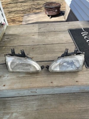 1992-1995 Honda Civic OEM Stanley Glass Headlights - Imagem 1 de 4