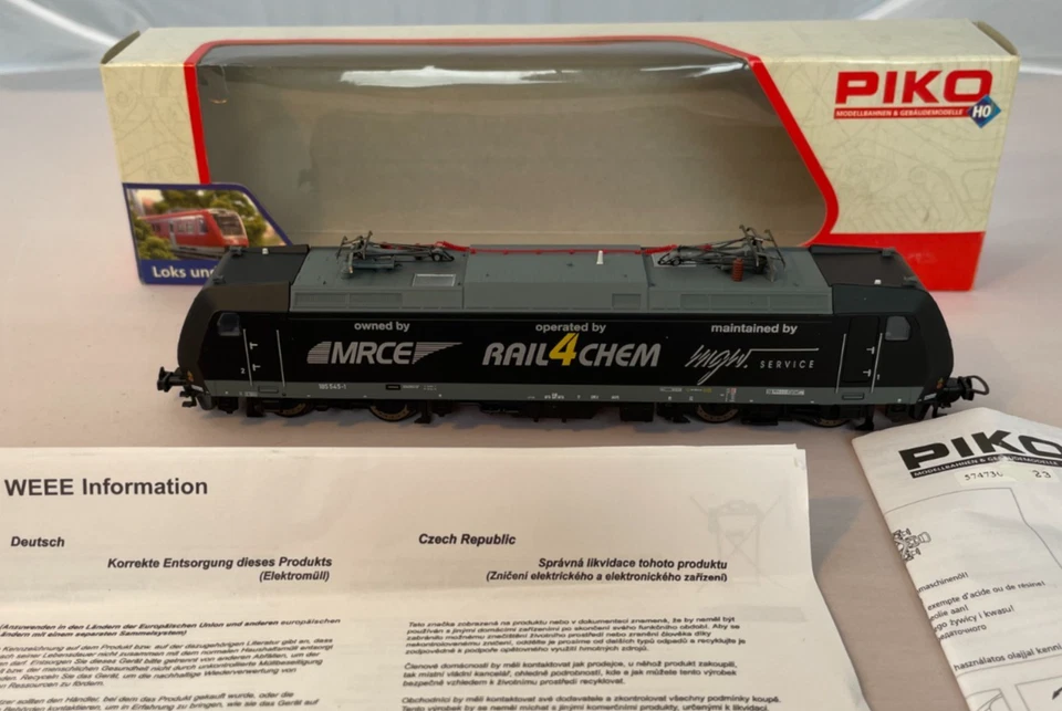 Piko HO 57473 BR185 OHE loco of MRCE/Rail4Chem. Black livery. New in box & p'wk - Image 1 of 4
