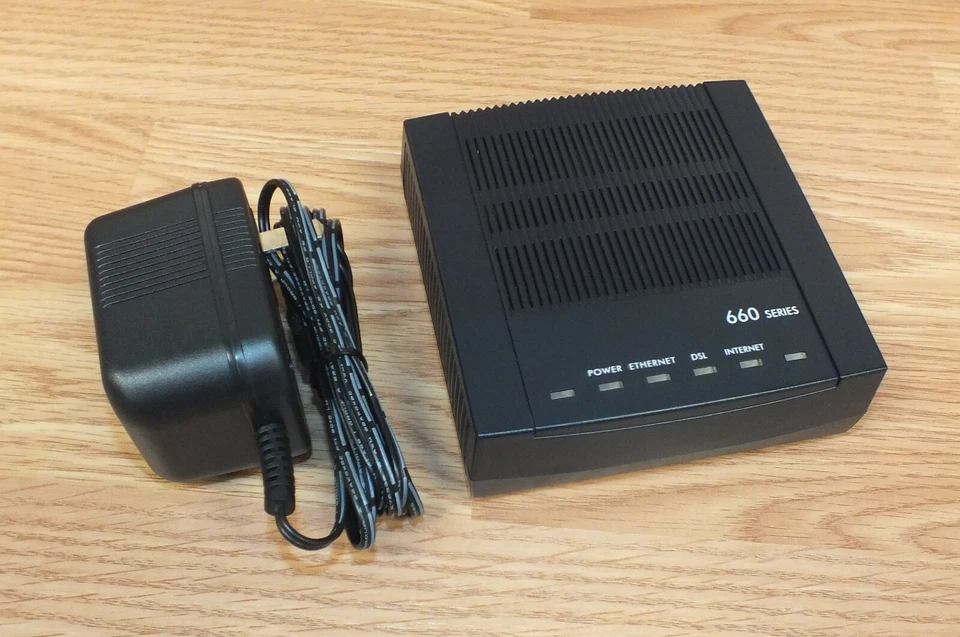 Unbranded SP-660 DSL Series Modem (ADSL 660) With AC Power Adapter  - Image 1 of 4