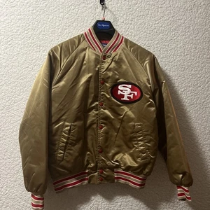 Vintage 90s NFL SAN FRANCISCO 49ERS Stahl-Urban BOMBER JACKET SPELL OUT, Size M - Picture 1 of 24