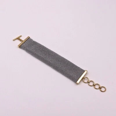 Brazalete de malla plateada Adami y Martucci con cierre de palanca dorado Foto 1 de 4