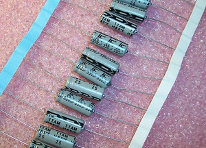 QTY (20)  330uf 25V 8x20mm AXIAL ALUMINUM ELECTROLYTIC CAPACITORS 337TTA025M - Picture 1 of 1