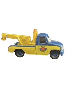 Disney Pixar Cars Pistón Taza Remolque Diecast Vehículo de Juguete Azul Amarillo Mattel - Imagen 1 de 6