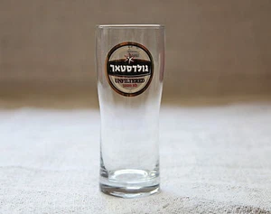 GOLDSTAR Gold Star Israel birra israeliana non filtrata 0,3 L/10,14 once vetro trasparente NUOVO - Foto 1 di 3