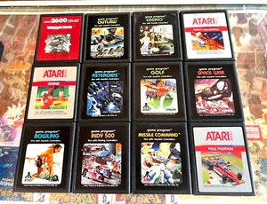 LOT OF 12 NEAR-MINT ATARI 2600 GAMES W/ MANUALS ASTEROIDS SPACE WAR OUTLAW +++ - Picture 1 of 11