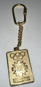 Olympic Games SARAJEVO 1984 VISOKO keychain Gold - Picture 1 of 2