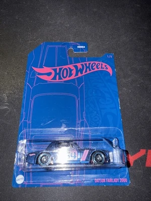 Hot Wheels Pearl and Chrome Datsun Fairlady 2000 1:6 Toy Car - HDH54 - Image 1 of 2