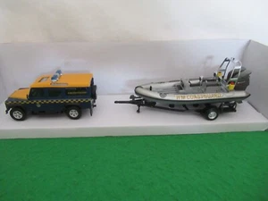 CARARAMA/OXFORD COASTGUARD LAND ROVER WITH SPEEDBOAT TRAILER SCALE 1:43 - Picture 1 of 8