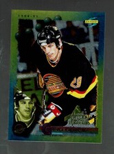 1994-95. Score. Gold Line. Punched.    Gino  Odjick     #9