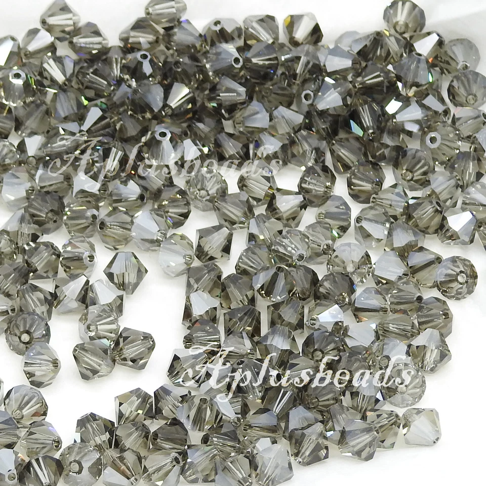 48 cuentas bicónicas de cristal de Swarovski Xilion de 5 mm #5301, #5328, recubiertas de satén Foto 1 de 1