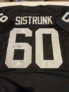 OAKLAND RAIDERS OTIS SISTRUNK #60 SIGNIERTES SCHWARZES HEIMTRIKOT SB XI CHAMPS Beckett - Bild 1 von 2