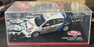 FORD FOCUS WRC RALLYE #7 M.MARTIN-M.PARK RALLYE MONTECARLO 2004 IXO ALTAYA  1:43 - Immagine 1 di 4