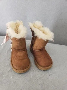 UGG Bailey Bow Boots Toddler Girls 7 Sheepskin Suede Ribbon Winter Shoes - Picture 1 of 21