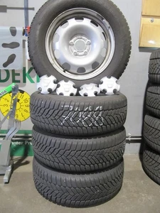 Dacia Duste Winterkomplettsatz 215/65R16 98H  Stahlfelge mit Kappen 6,5Jx16 ET50 - Bild 1 von 3
