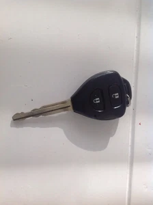 GENUINE TOYOTA HILUX RAV4 COROLLA ETC 2 BUTTON REMOTE KEY FOB - FULLY WORKING - Picture 1 of 4