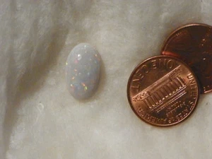 Australischer Edelopal 3,46 Karat 9,84x15,54x4,00 mm. Oval Fahrerhaus viel Feuer - Bild 1 von 4