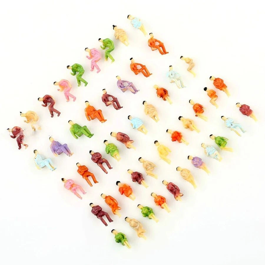 100x Spur N nur sitzende Figuren 1:160 Modellbahn bemalt Reisende für Waggons - Bild 1 von 4