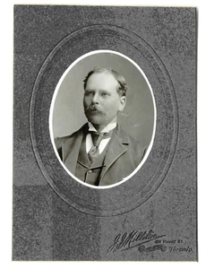 MAN WITH MUSTACHE IN JACKET AND TIE by J. J. MILLIKIN STUDIO YOUNGE ST. TORONTO - Bild 1 von 4